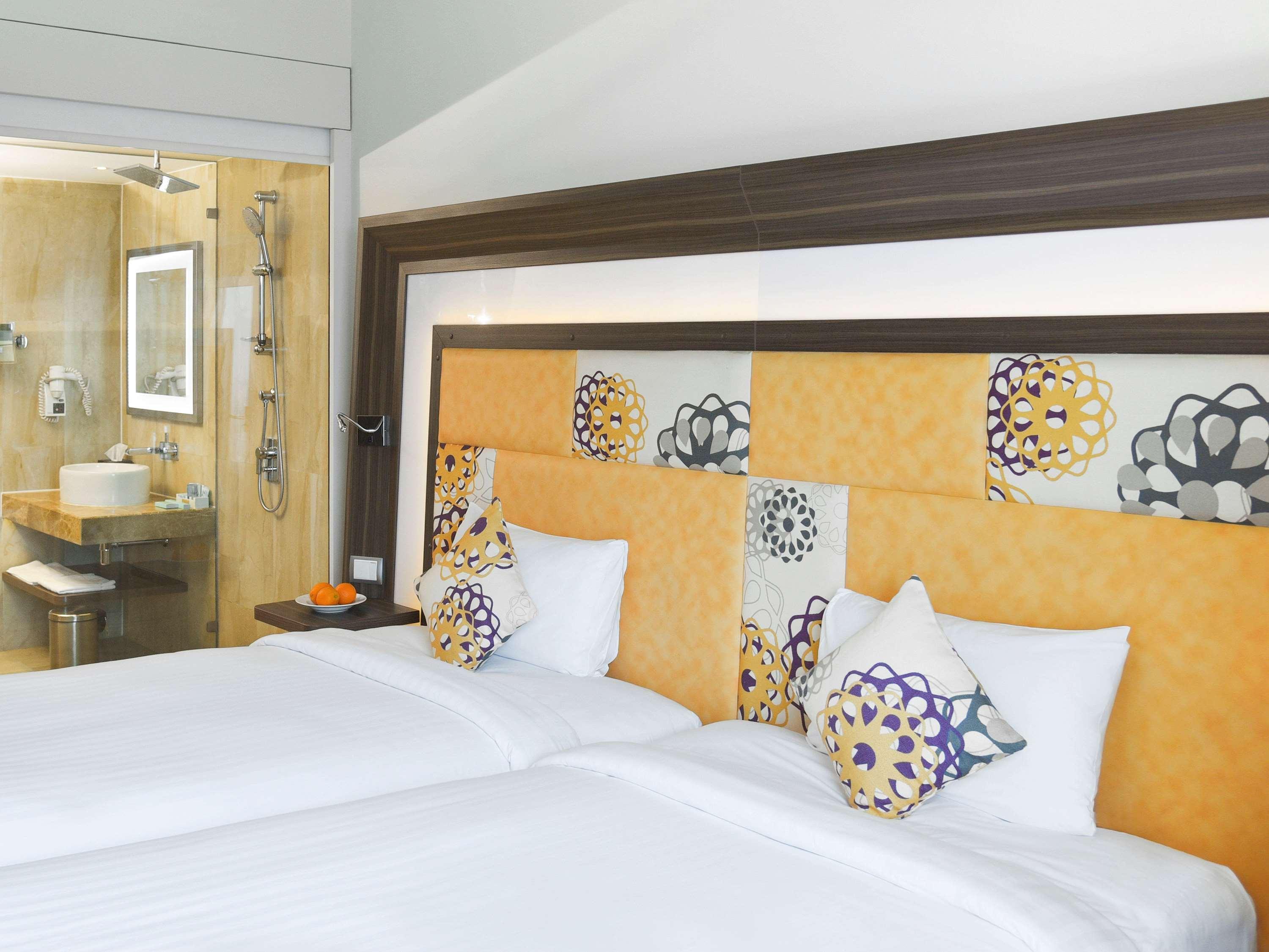 Novotel Pune Viman Nagar Road Exterior photo A room at the hotel