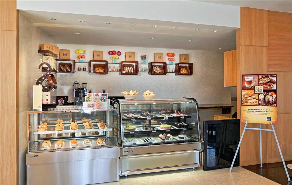 Novotel Pune Viman Nagar Road Exterior photo A pastry shop in Athens, Greece