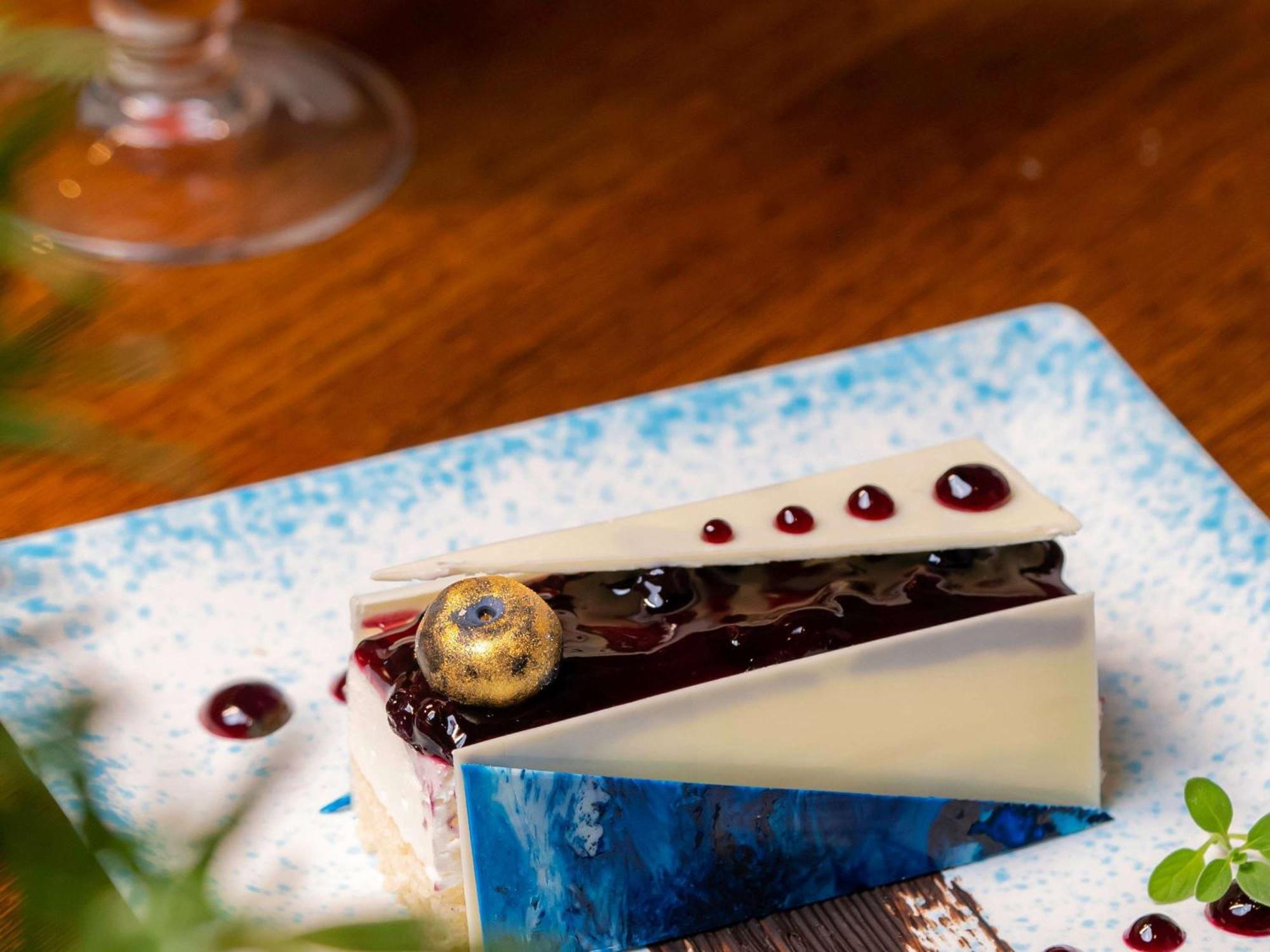 Novotel Pune Viman Nagar Road Exterior photo A blueberry cheesecake
